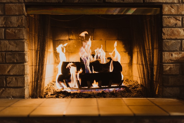 Find a cosy pub with a roaring fire to warm up in